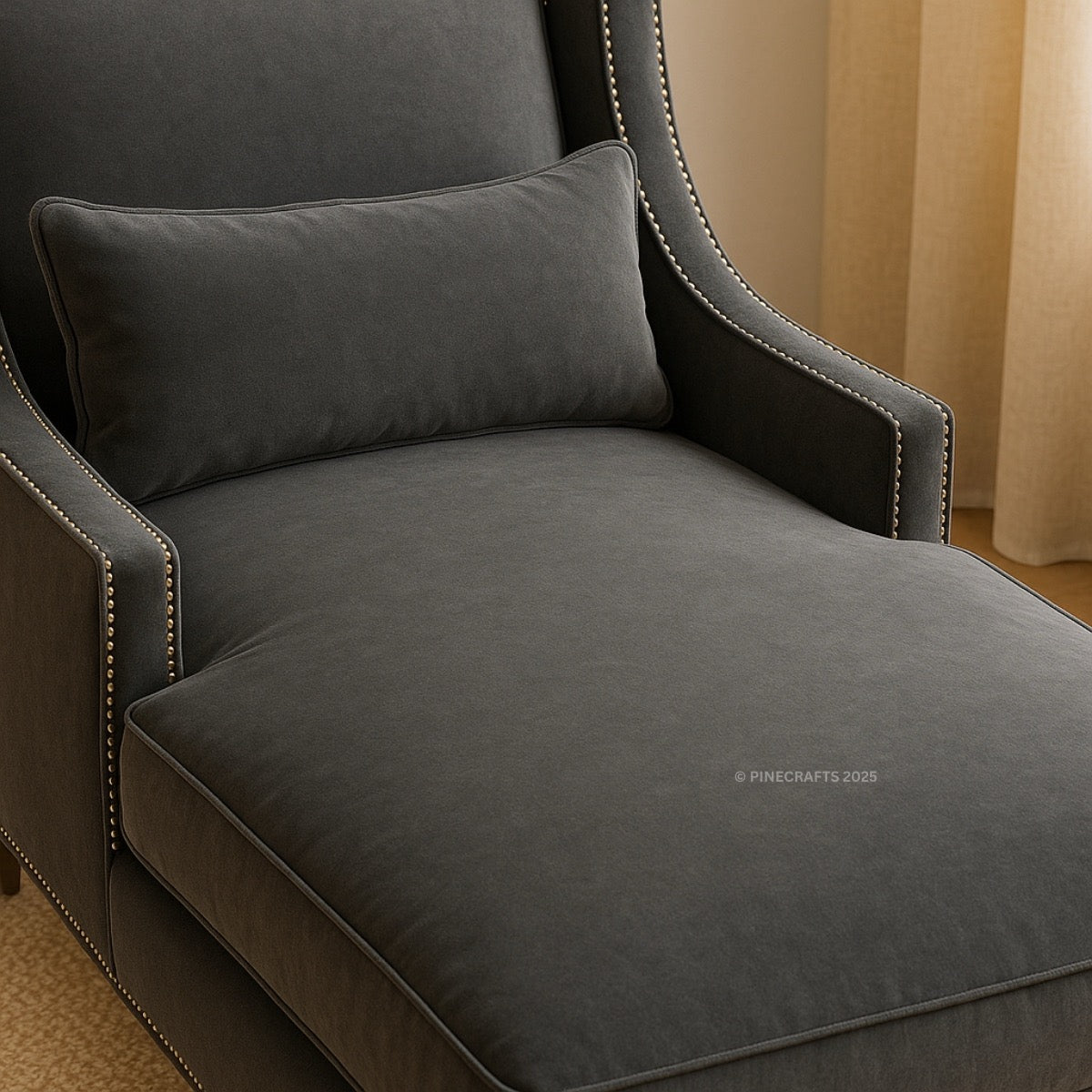 Gray armchair with a pillow in a room setting