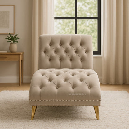 Beige tufted chair in a room with a window and side table.