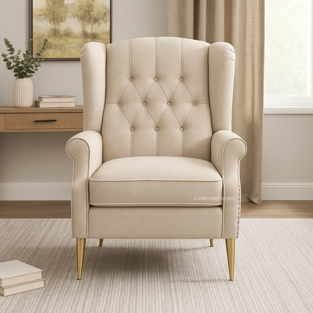 Beige armchair in a room with a desk and window