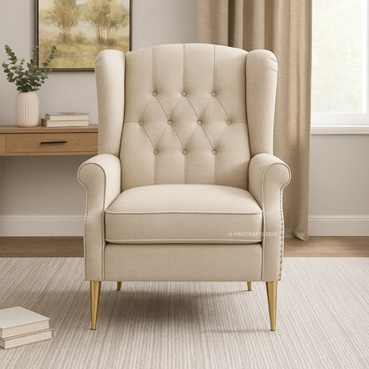 Beige armchair in a room with a desk and window
