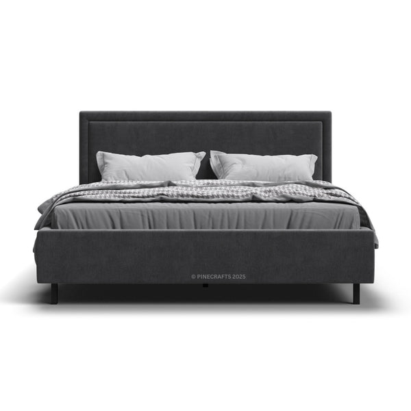 Gray upholstered bed with white bedding on a white background