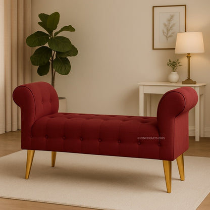 Red tufted bench with gold legs in a living room setting