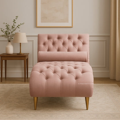 Pink tufted chair in a room with a lamp and decorative elements.