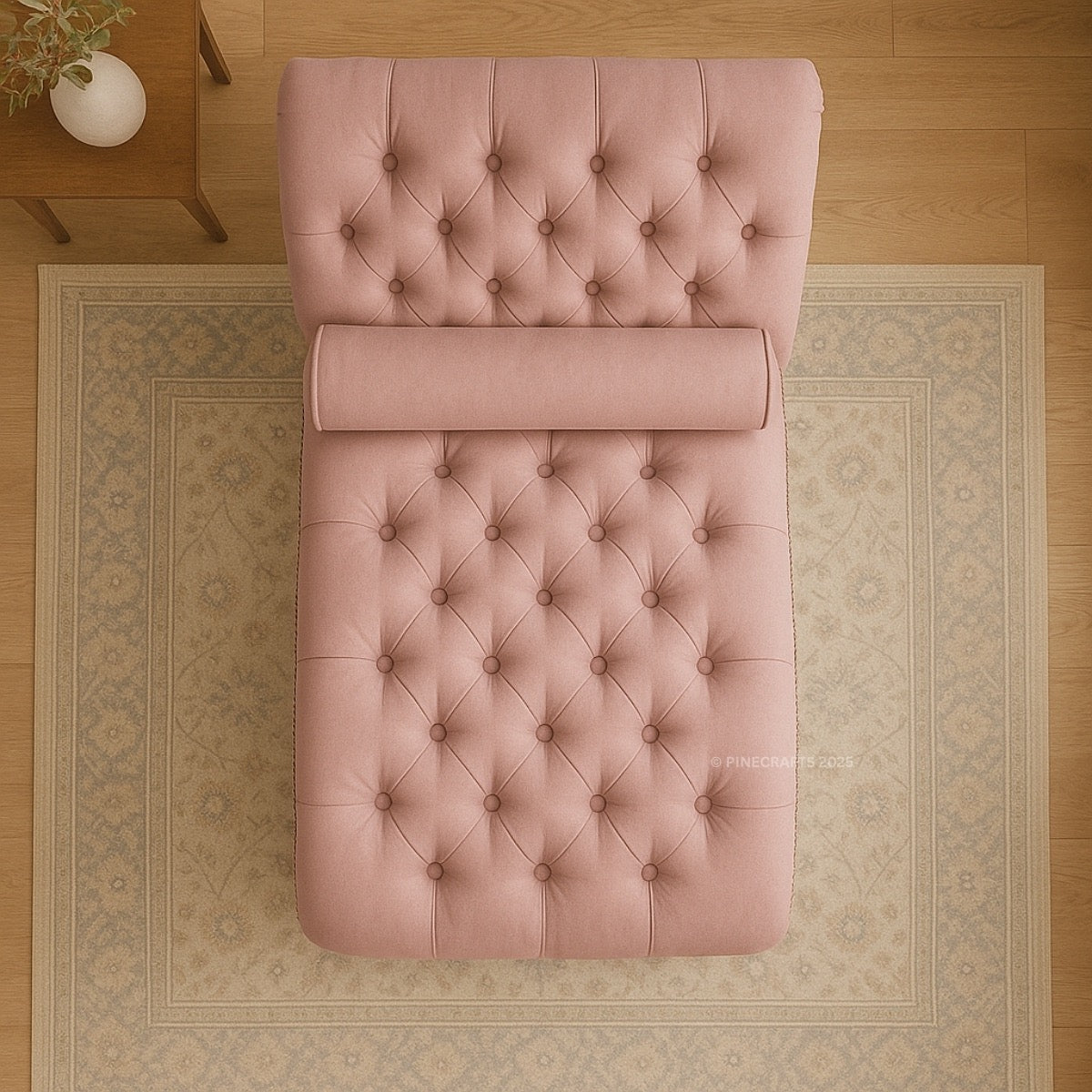 Pink tufted bench on a patterned rug with wooden floor