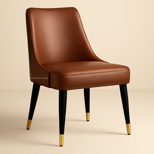 Brown leather chair with black legs and gold foot caps on a beige background