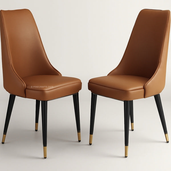 Two brown leather chairs with black legs and gold tips on a light gray background