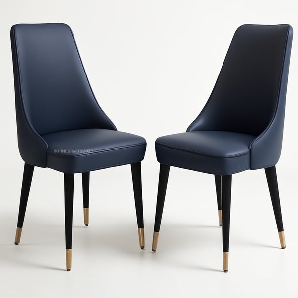 Two navy blue chairs with gold feet on a white background