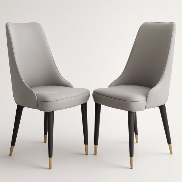Two gray chairs with black legs on a white background