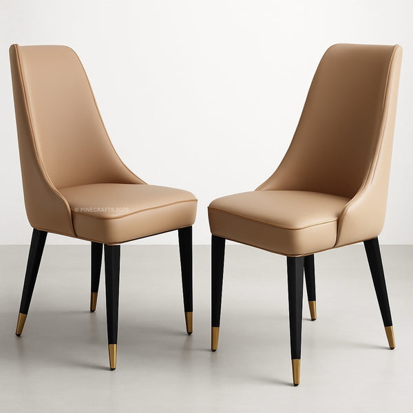 Two beige chairs with black legs on a light gray background