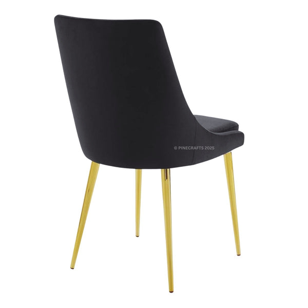 Black chair with gold legs on a white background