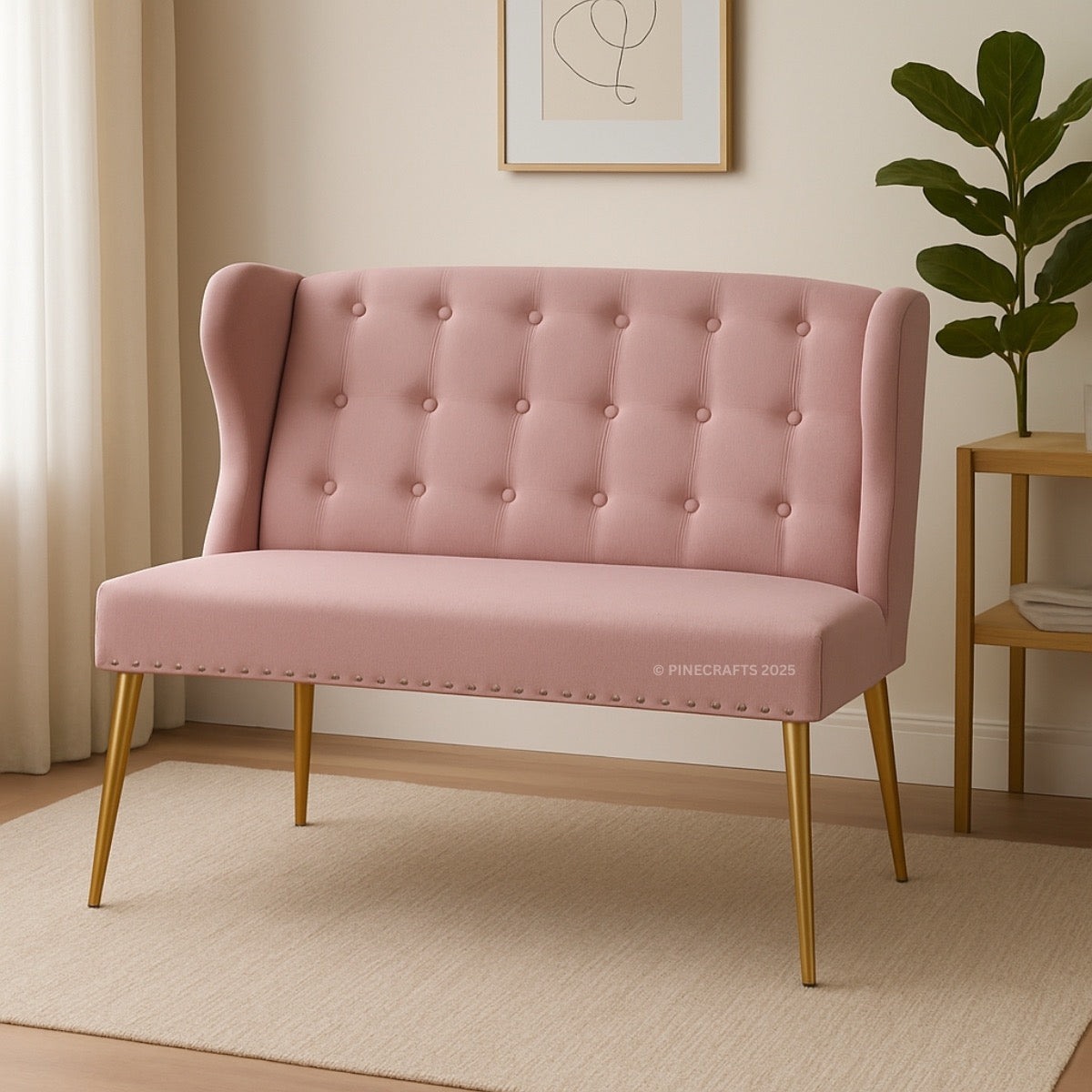 Pink tufted bench with gold legs in a room setting