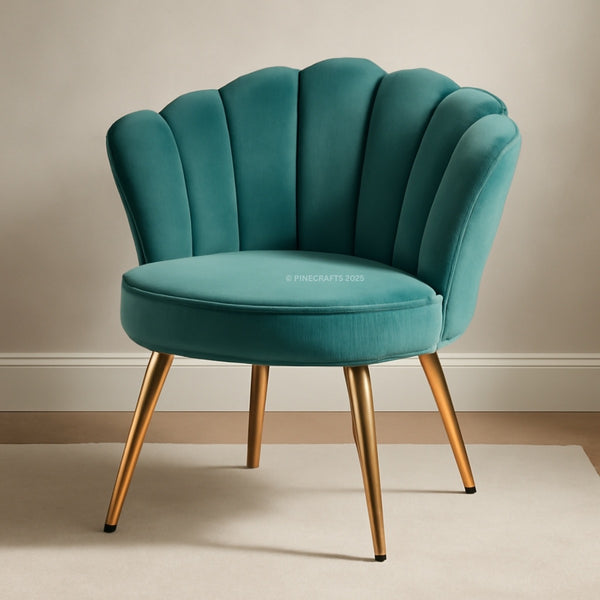 Teal velvet armchair with gold legs on a neutral background