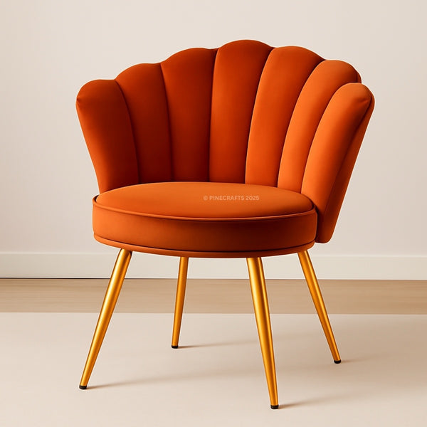 Orange chair with scalloped backrest and gold legs on a beige background