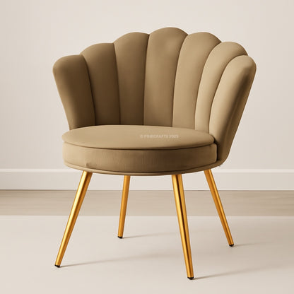 Beige chair with scalloped backrest and gold legs on a plain background
