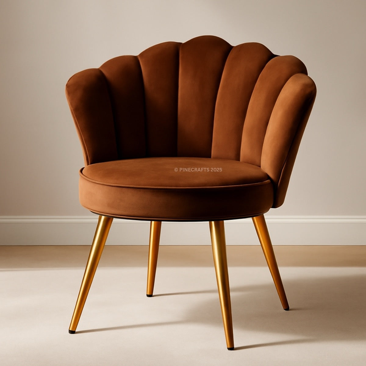Brown velvet chair with gold legs on a beige background