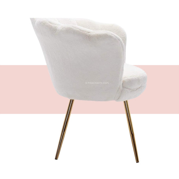 White chair with gold legs on a white background