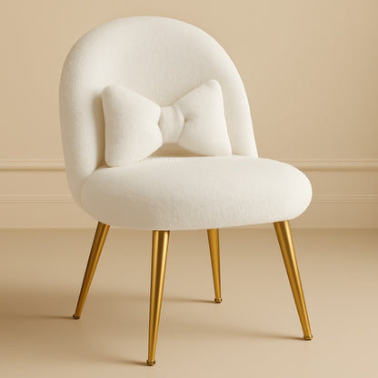 White chair with gold legs on a beige background