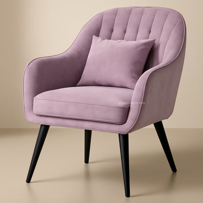 Pink armchair with a pillow on a beige background