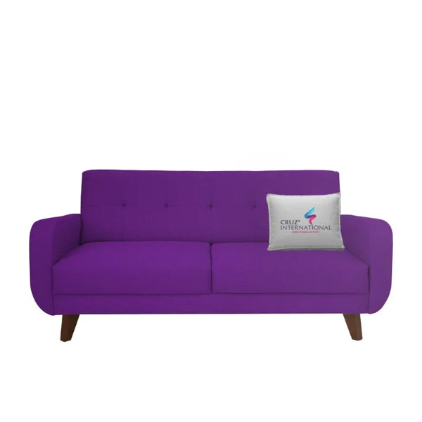 Purple modern sofa with wooden legs and branded cushion from CRUZ INTERNATIONAL Furniture Store