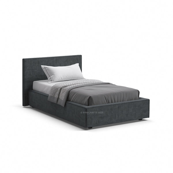 Gray upholstered bed with white bedding on a white background
