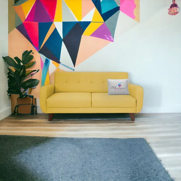 Modern yellow sofa from CRUZ INTERNATIONAL in living room with geometric wall art and plant.