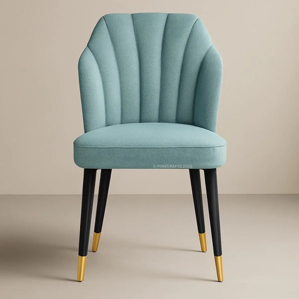 Teal chair with black legs and gold feet on a beige background