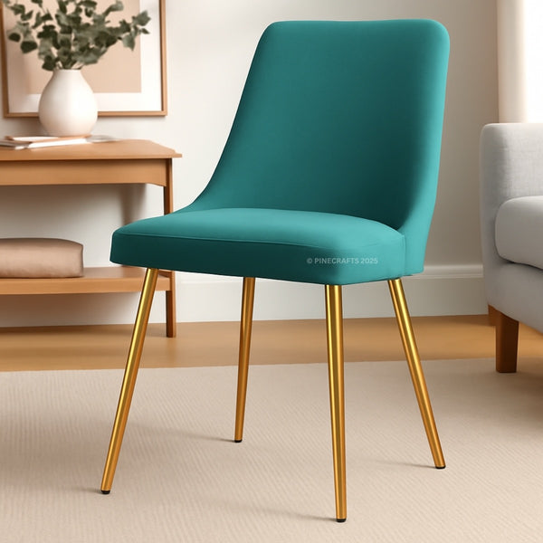 Teal chair with gold legs in a room setting