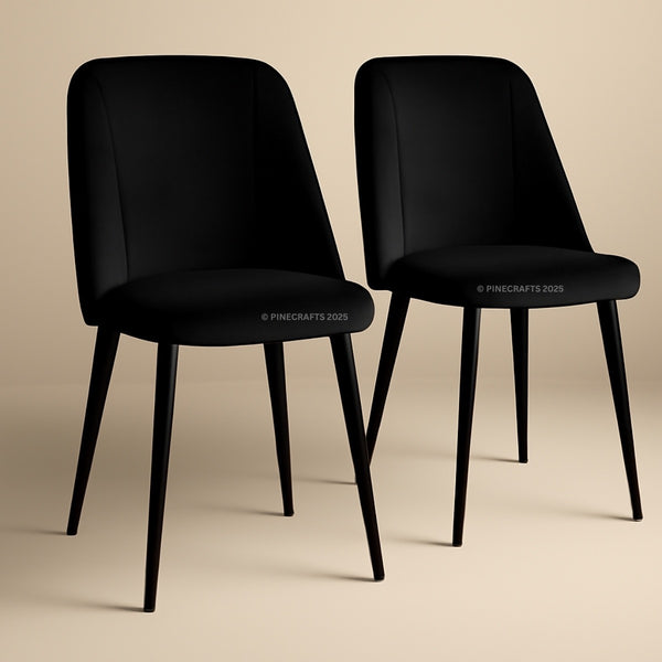 Two black chairs with a beige background
