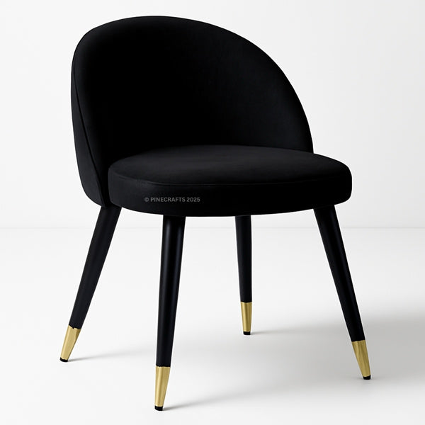 Black chair with gold feet on a white background