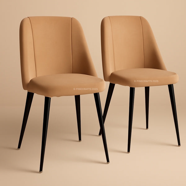 Two tan chairs with black legs on a beige background