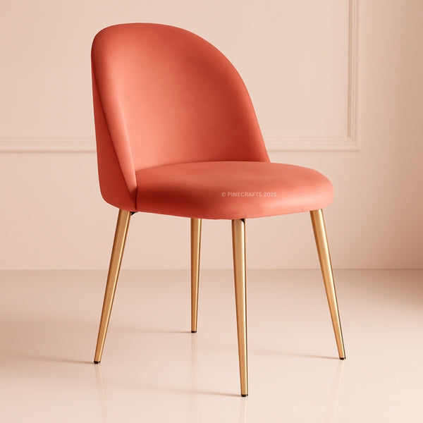 Coral chair with gold legs on a beige background