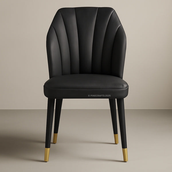 Black chair with gold feet on a beige background