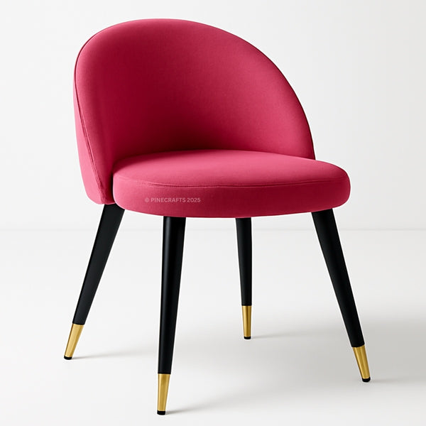Pink chair with black legs and gold foot caps on a white background
