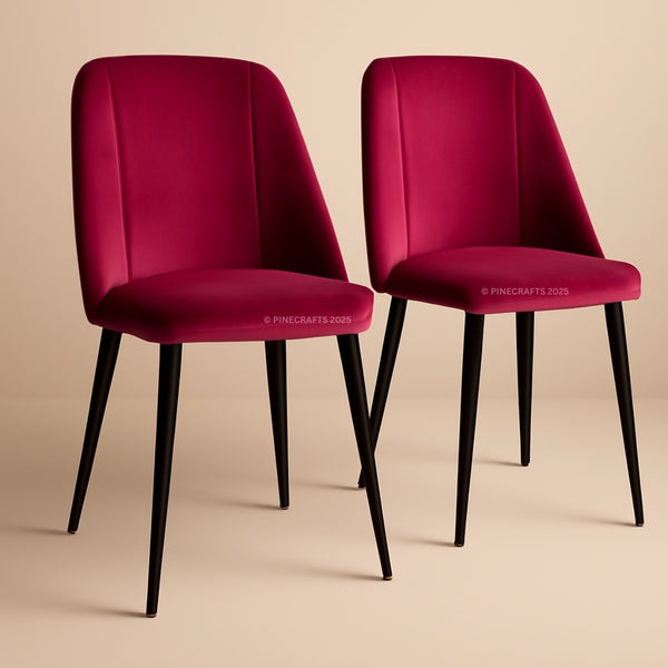 Two red chairs with black legs on a beige background