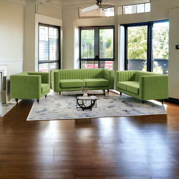 A modern green three-seater sofa set in a bright room with a window, a rug, and a coffee table in the foreground.