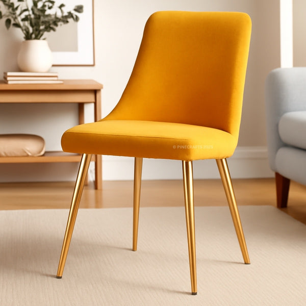 Yellow chair with gold legs in a room setting