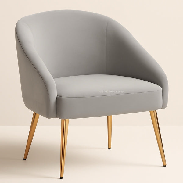 Gray armchair with gold legs on a beige background