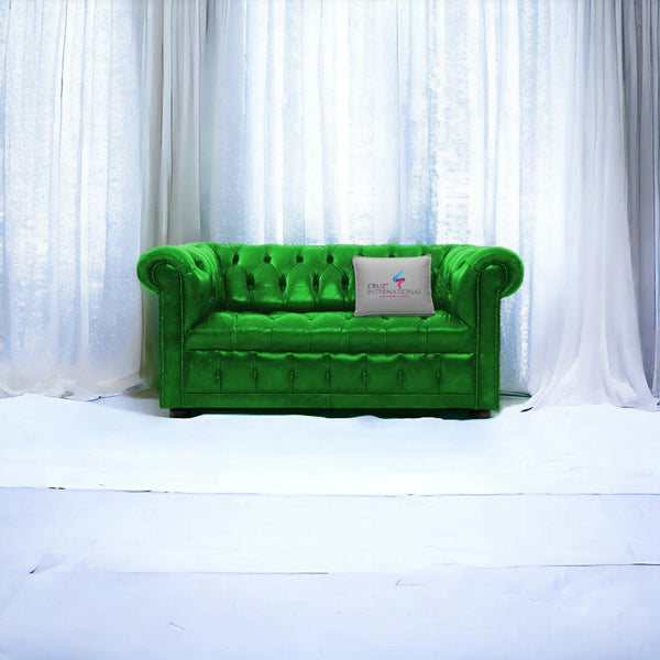 Green tufted sofa with CRUZ INTERNATIONAL pillow, modern living room furniture