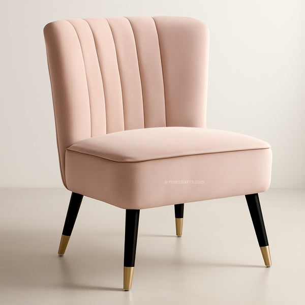 Pink chair with black legs and gold feet on a light background