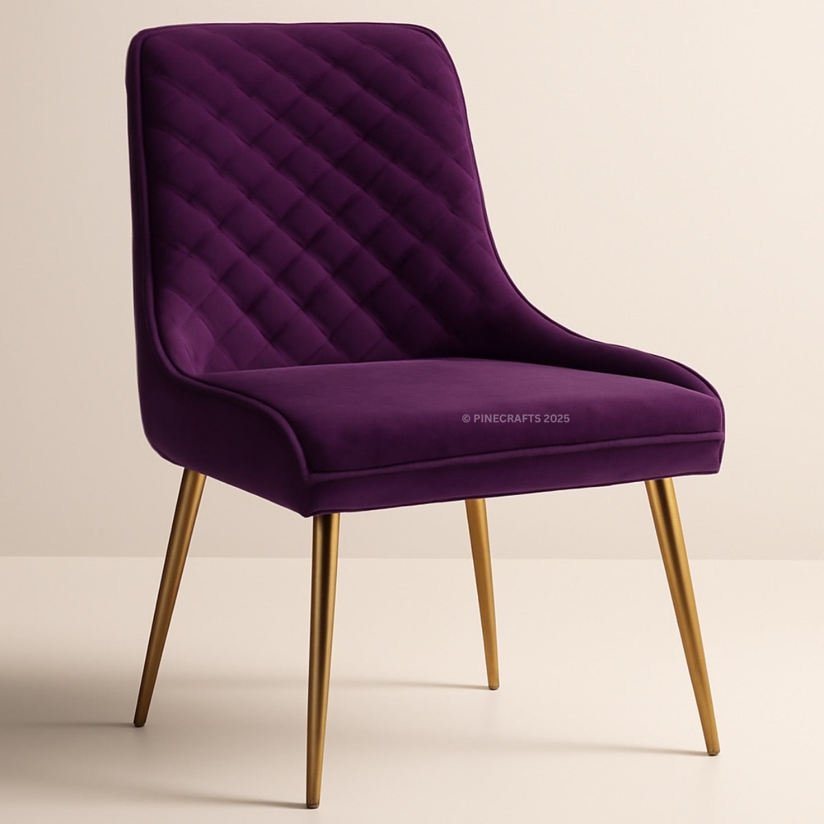 Purple quilted chair with gold legs on a beige background