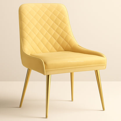 Yellow quilted chair with gold legs on a beige background