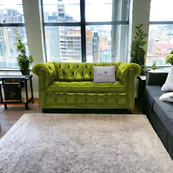 Light green tufted sofa in modern living room at CRUZ INTERNATIONAL Furniture Store