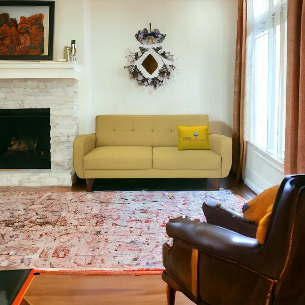 Modern living room with a light yellow CRUZ INTERNATIONAL sofa, pillow, and cozy decor