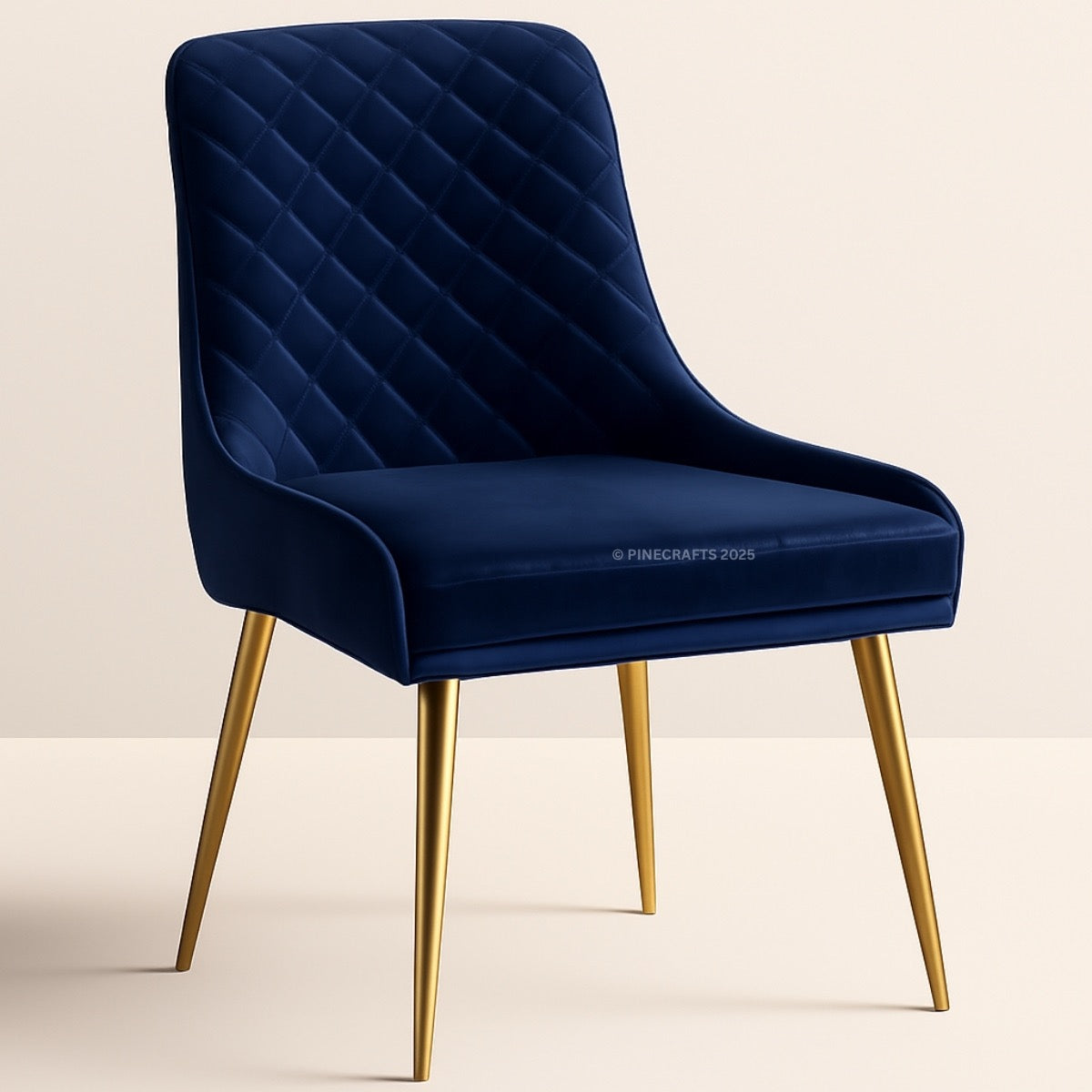 Blue velvet chair with gold legs on a beige background