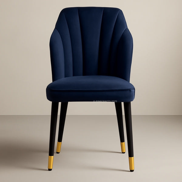 Navy blue chair with gold accents on a beige background
