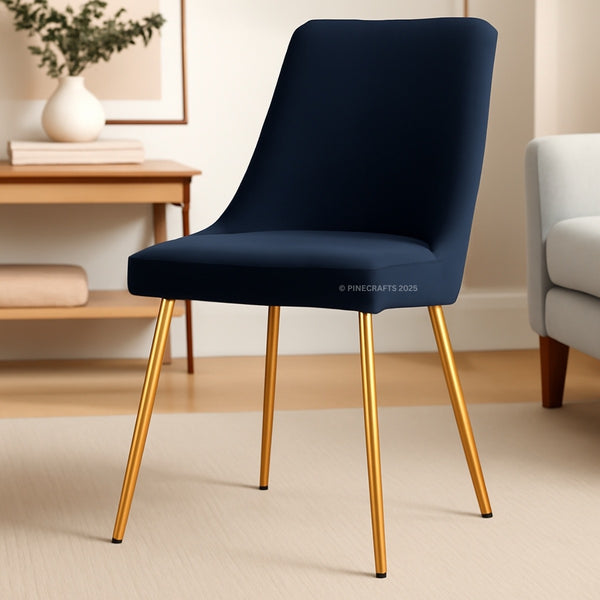 Navy chair with gold legs in a room setting