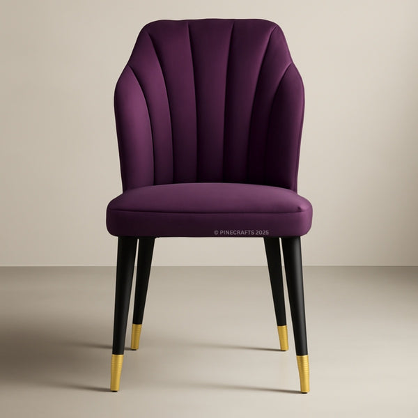Purple chair with black legs and gold feet on a beige background