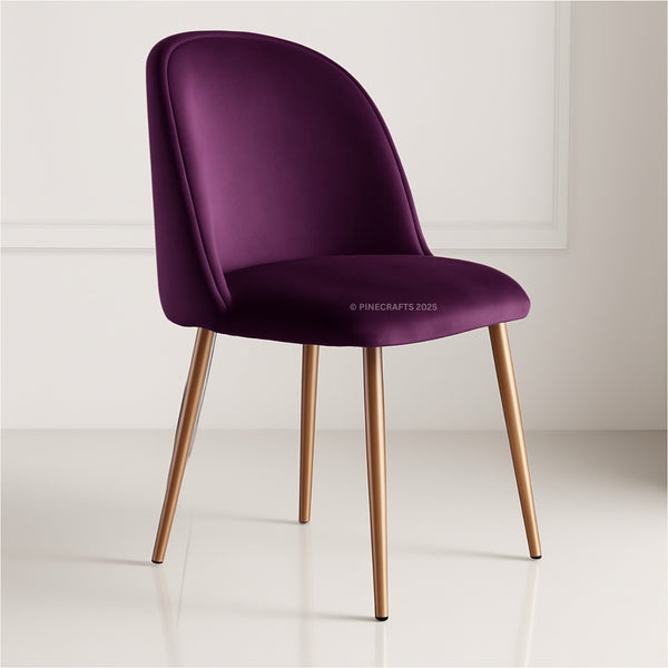 Purple chair with gold legs on a white floor and light gray wall background