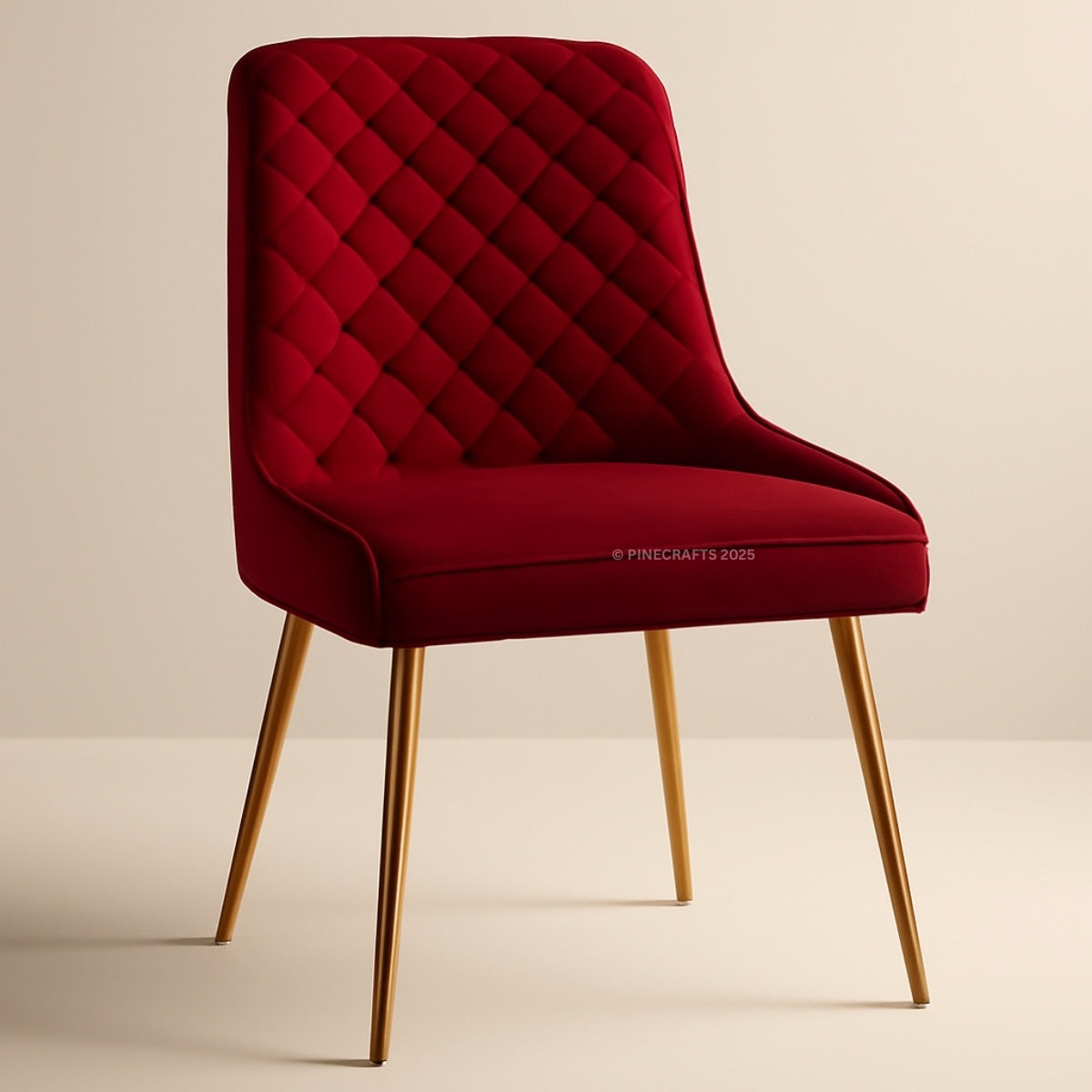 Red quilted chair with gold legs on a beige background