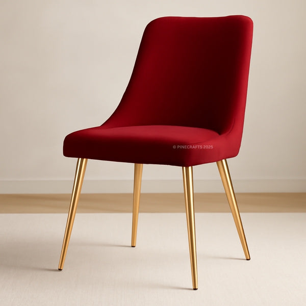 Red chair with gold legs on a beige background